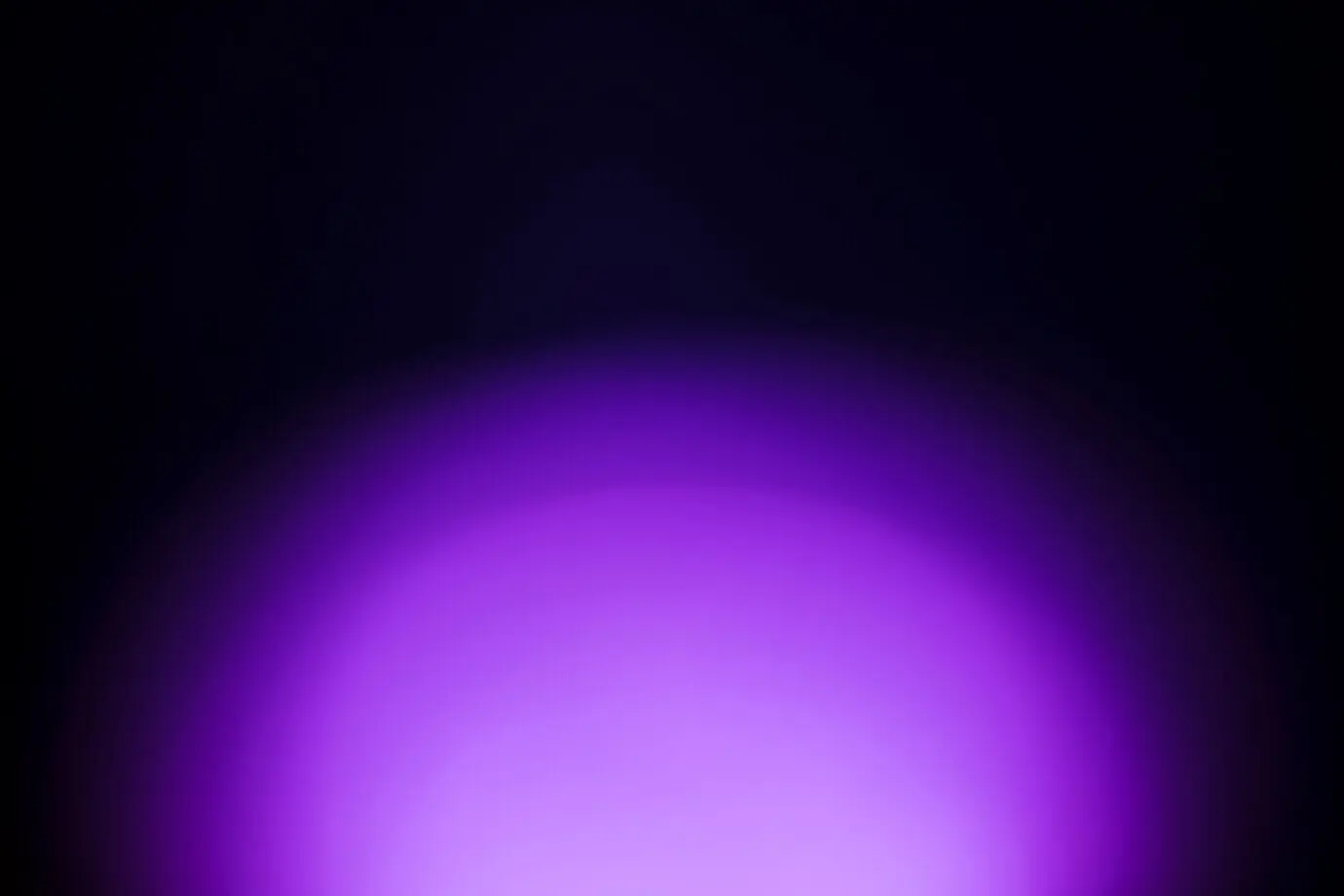 A bright light against a dark background